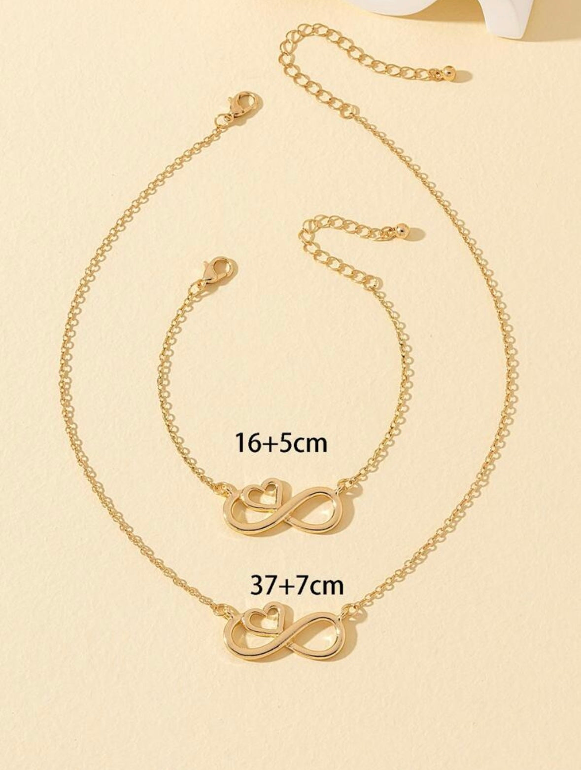 Ensemble collier et bracelet avec pendentif géométrique en forme de huit en forme de cœur métallique 1 pièce